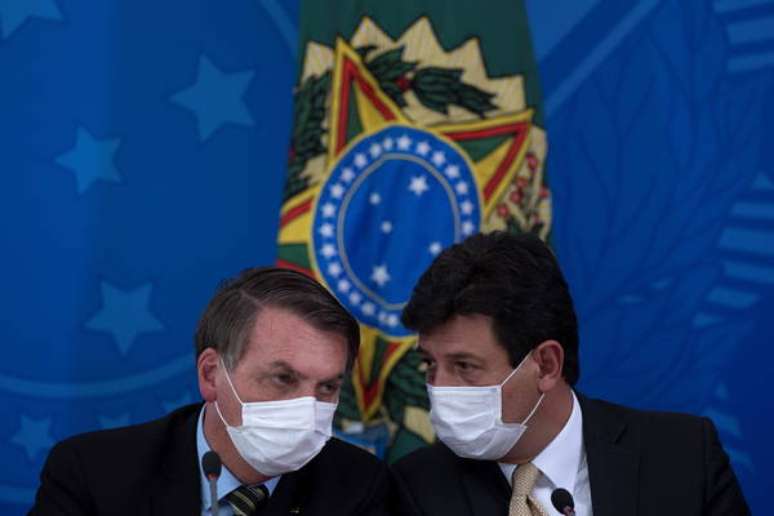 Bolsonaro e Mandetta durante coletiva de imprensa em Brasília, em 18 de março