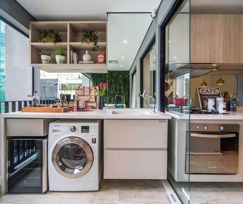 16. Apartamento decorado com varanda planejada com lavanderia &ndash; Foto: Construindo Minha Casa Clean