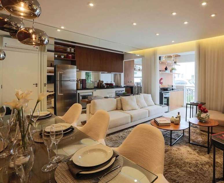 25. Decoração de apartamento pequeno com ambientes integrados em cores claras e neutras – Foto: Pinterest