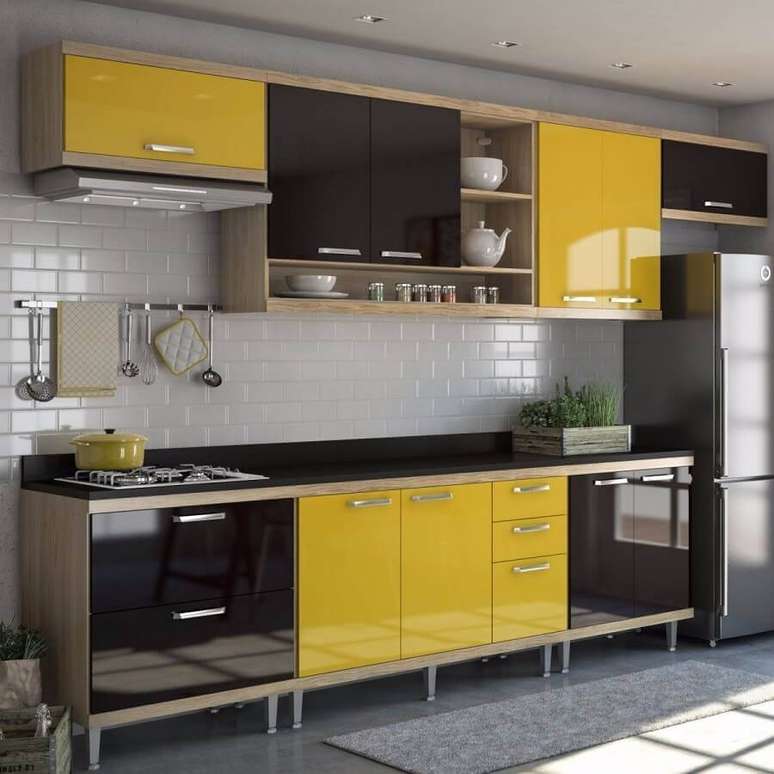 16. Decoração simples com móveis modulados cozinha amarela e preta – Foto: Pinterest