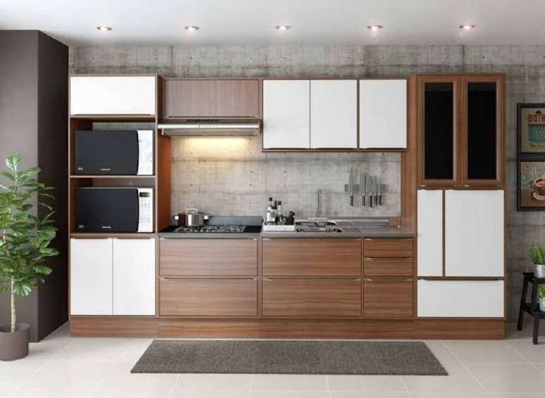 25. Decoração de cozinha modulada com pia e armários de madeira – Foto: Multimóveis