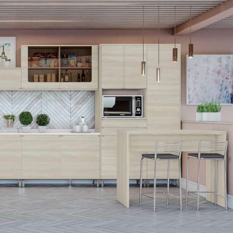 48. Decoração para cozinha modulada com bancada de madeira – Foto: Dicas Decor