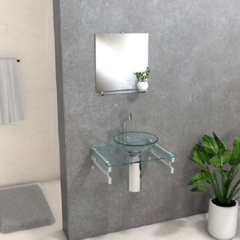 32. Pia de banheiro de vidro sem gabinete é indicada para um ambiente menor – Foto: Via Pinterest