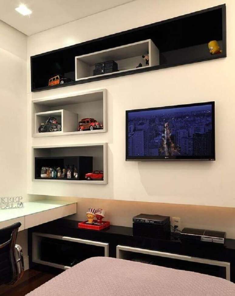 69. Decoração de quarto gamer simples com nichos embutidos – Foto: Casa de Valentina