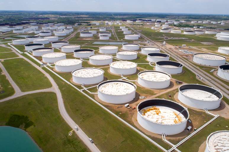 FILE PHOTO: Crude oil storage tanks are seen in an aerial photograph at the Cushing oil hub in Cushing, Oklahoma, U.S., April 21, 2020. REUTERS/Drone Base/File Photo