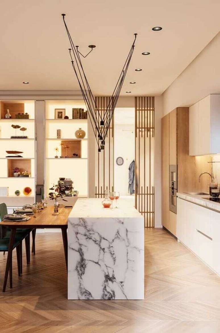 38. Cozinha completa com ilha de mármore e decoração moderna – Foto: Behance
