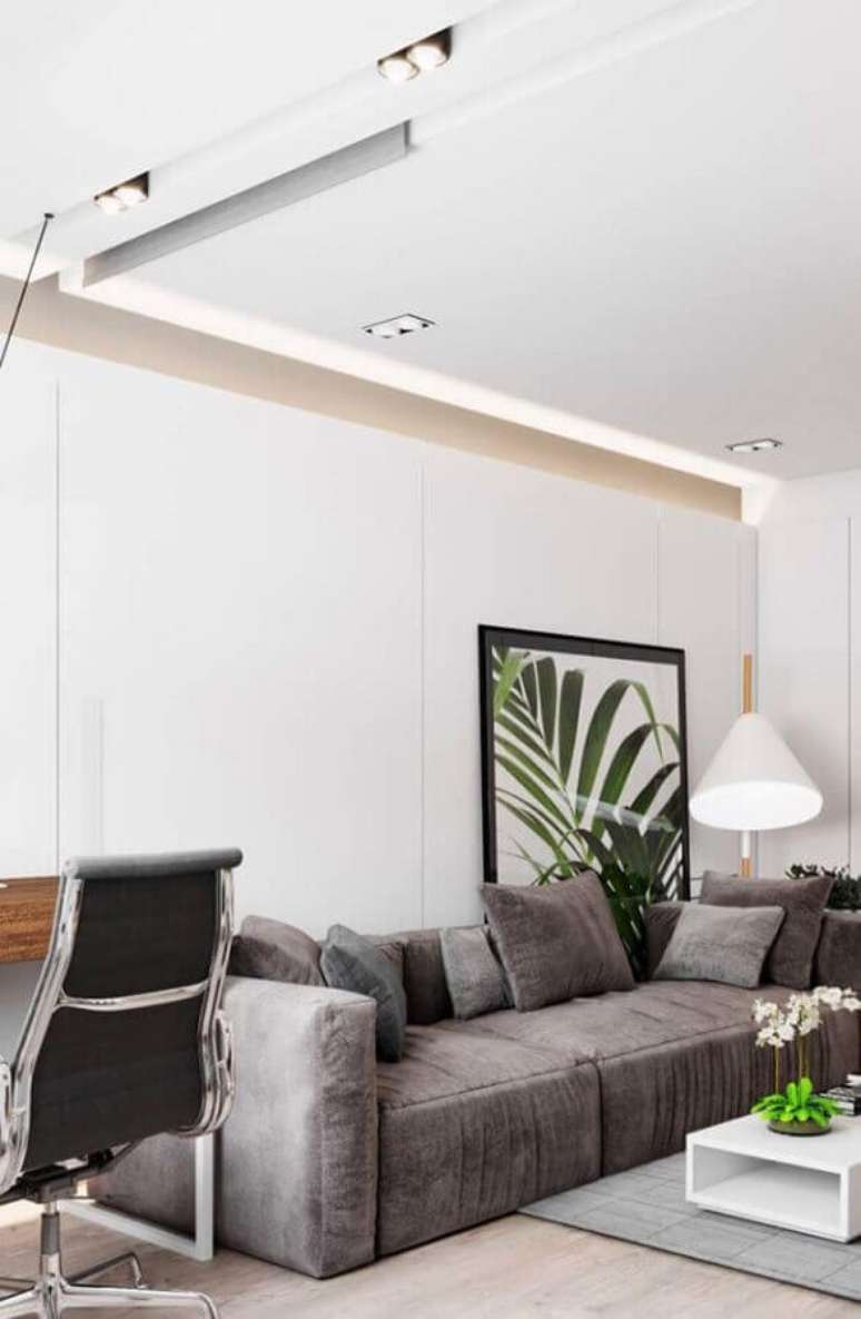 70. Sala decorada com sofás moderno cinza – Foto: Webcomunica