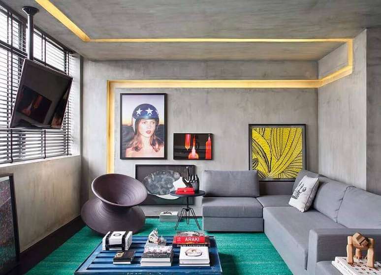 76. Sofás de canto modernos para decoração de sala contemporânea com parede de cimento queimado – Foto: Pinterest