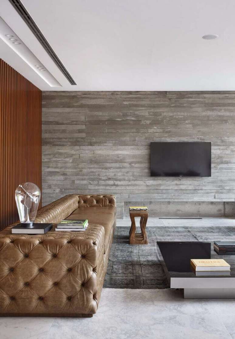 78. Sala moderna decorada com sofá de couro com acabamento capitonê Foto: Archilovers