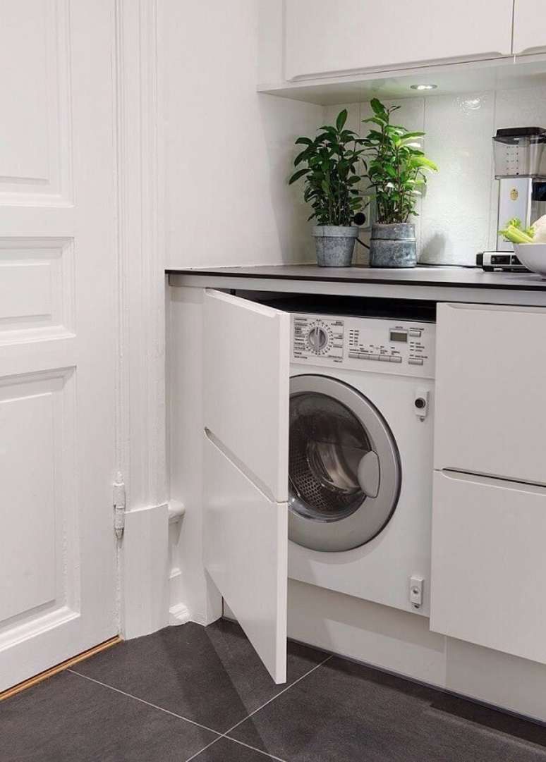 57. Opte por móveis para lavanderia funcionais e criativos. Fonte: Revista Viva Decora