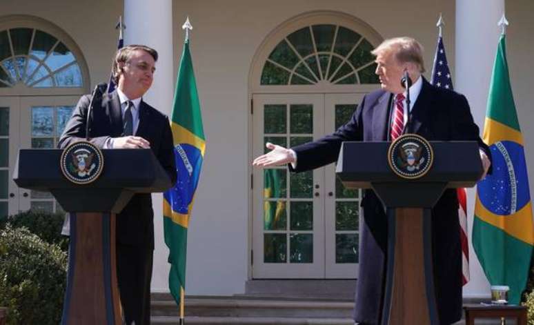 Jair Bolsonaro e Donald Trump durante encontro na Casa Branca, em 19 de março