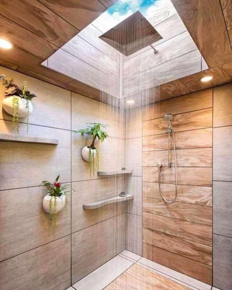 26. Aqui o banheiro rústico moderno ganhou vasos de plantas para parede do box – Foto: Architecture Art Designs
