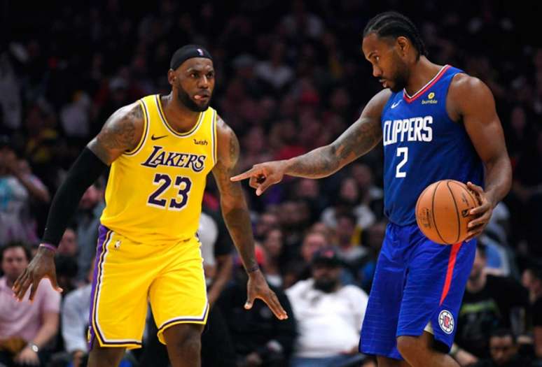 LeBron James e Kawhi Leonard comandam os grandes favoritos: Lakers e Clippers (Foto: HARRY HOW / AFP)