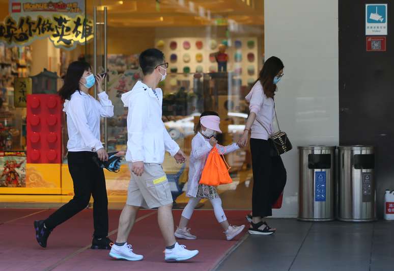 As pessoas usam máscaras em Pequim, na China