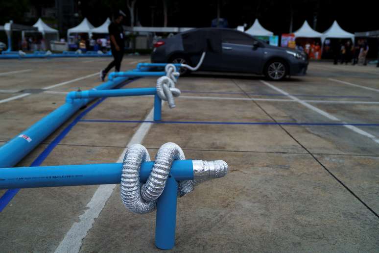 Sistema de refrigera&ccedil;&atilde;o para carros em cinema drive-in em Bangcoc
02/07/2020
REUTERS/Athit Perawongmetha