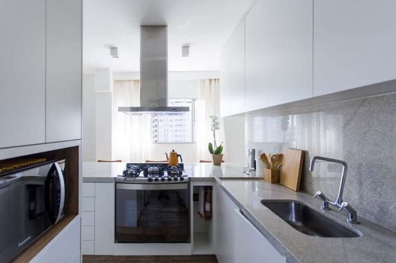 3. Como desentupir fog&atilde;o com uma pe&ccedil;a similar a uma agulha. Projeto por PAGAMA arquitetura + design