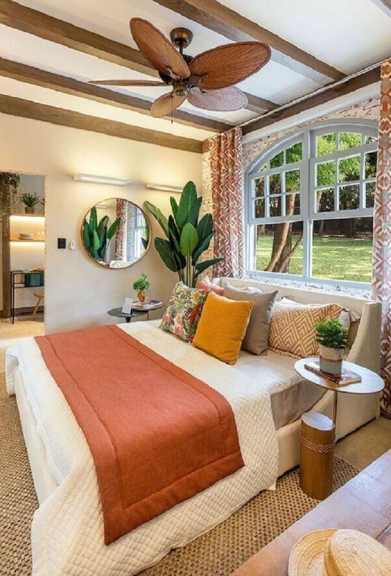 3. Tons terrosos e estampas florais são ótimas para almofadas para cama de quarto com estilo rústico – Foto: Casa de Valentina