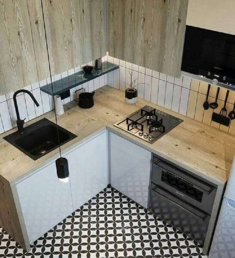 16. Bancada para cozinha pequena de canto feita em madeira &ndash; Foto: Archzine