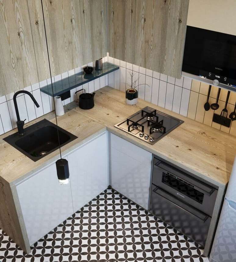 12. Invista no armário de cozinha de canto pequeno para otimizar melhor o espaço compacto – Foto: Archzine