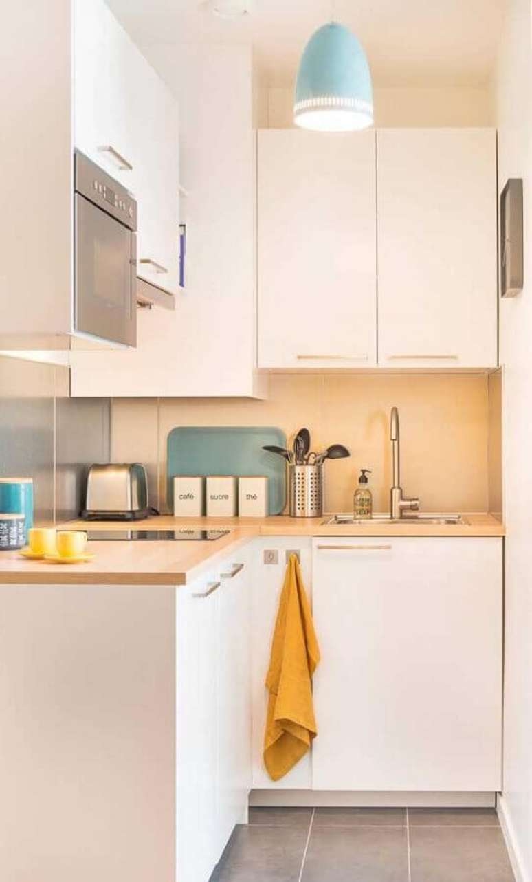 6. Invista em um bom modelo de armário de cozinha de canto pequeno – Foto: Pinterest