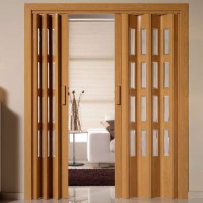 47. Porta sanfonada de madeira para escritório moderno – Via: Office Carpets Dubai
