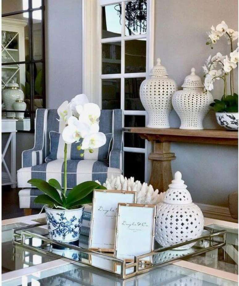 32. Orquídea branca no centro de mesa – Via: Pinterest 