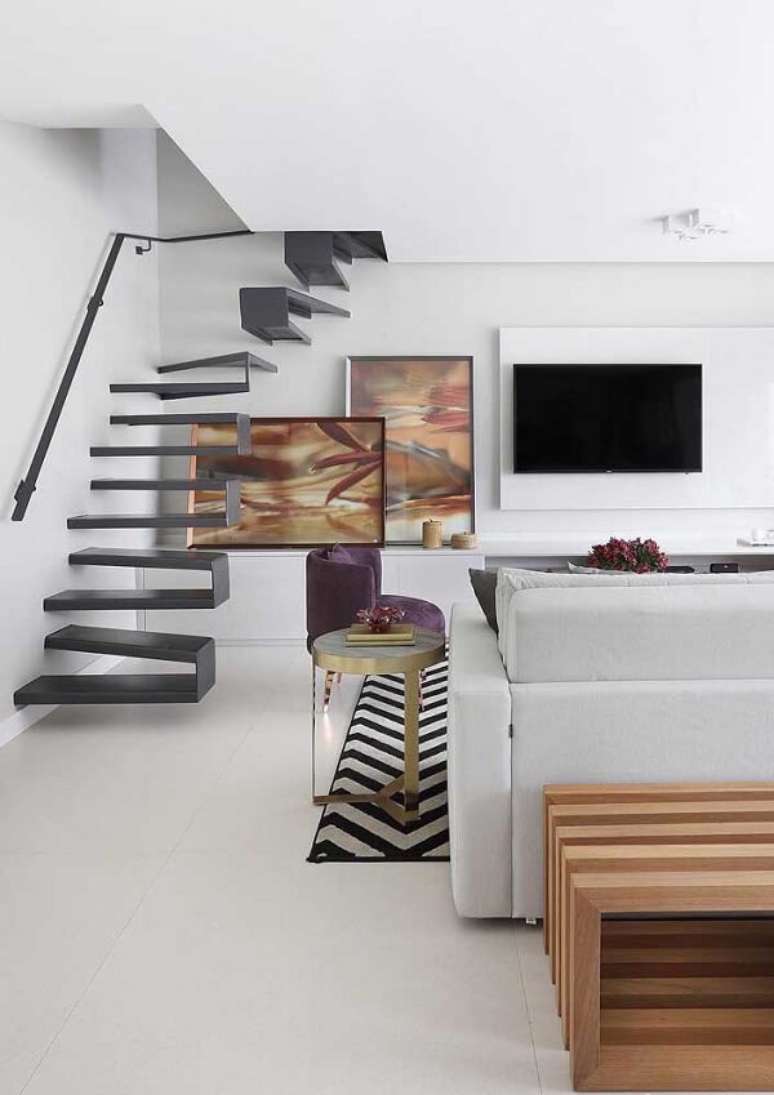 3. Os quadros para sala de TV foram alinhados de forma vertical e horizontal. Fonte: Pinterest