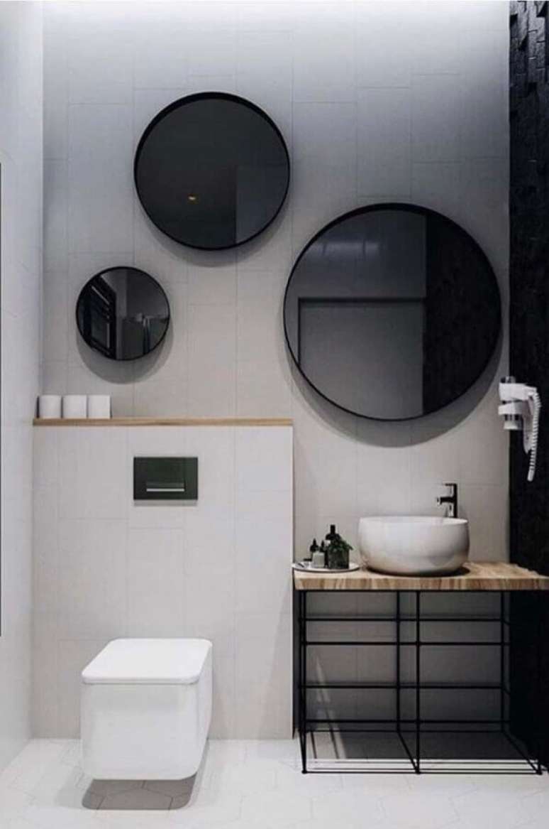 33. Decoração moderna com espelhos para banheiro redondo – Foto: Home Fashion Trend