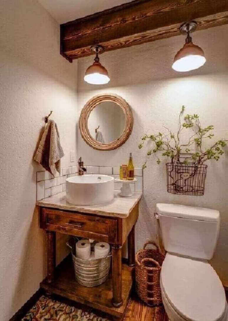 5. Decoração simples com espelho redondo para banheiro com moldura rústica – Foto: ArchDaily