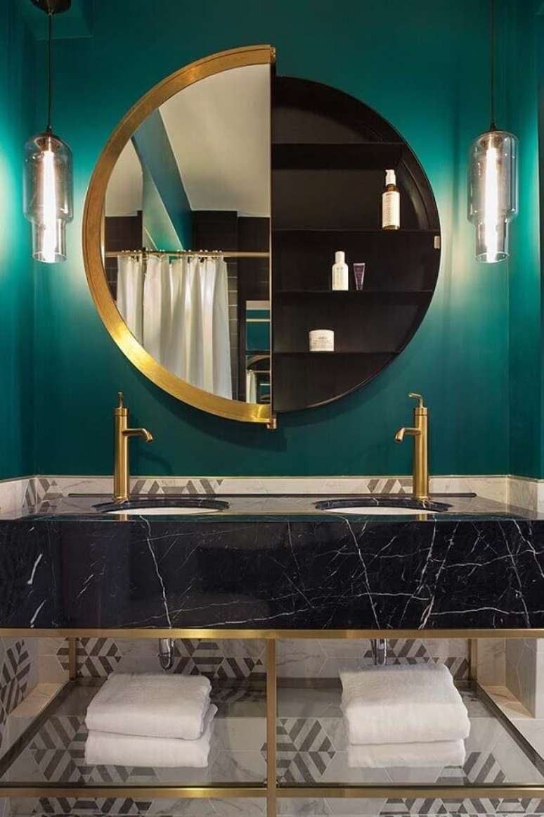 8. Design moderno de espelho redondo para banheiro de luxo – Foto: Archilovers