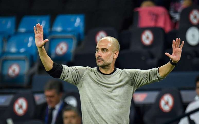 Guardiola está no Manchester City desde 2016 (Foto: Peter Powell/AFP)