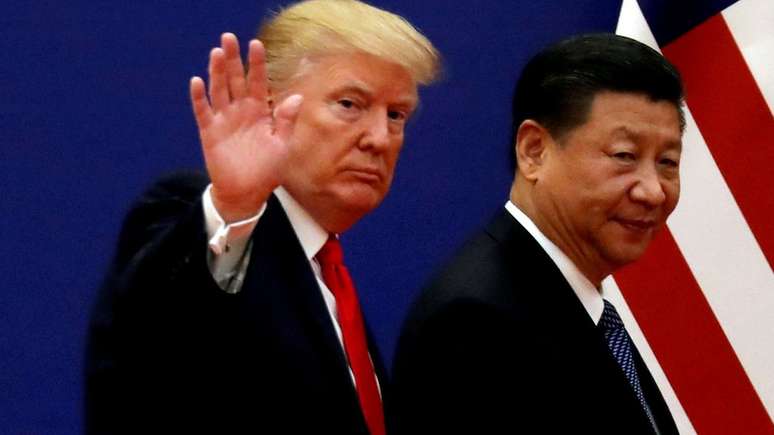 Donald Trump e Xi Jinping, em foto de 2017; EUA e China vivem uma guerra comercial e a uma disputa de narrativas sobre os esforços para conter a pandemia do novo coronavírus