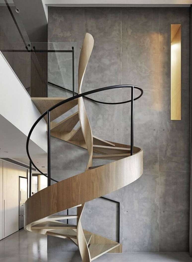 74. O guarda corpo de ferro tamb&eacute;m pode ser usado para ambientes modernos e escadas de madeira com design arrojado &ndash; Foto: Riosbrook