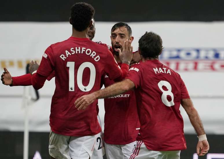 Jogadores do United comemoram gol sobre o Newcastle (Owen Humphreys / POOL / AFP)