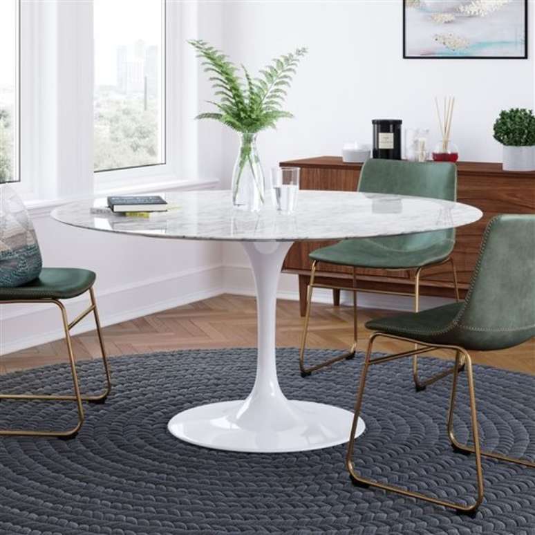 42. Use a mesa saarinen redonda na sala de jantar pequena &ndash; Via: Inmod