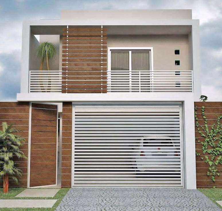 Fachada de casa clássica contemporânea com cor concreto e aberturas pretas!  - Decor Salteado