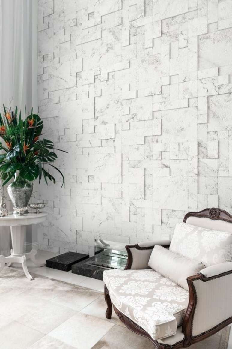 32. Revestimento 3D para sala com poltrona cl&aacute;ssica &ndash; Via: Castelatto