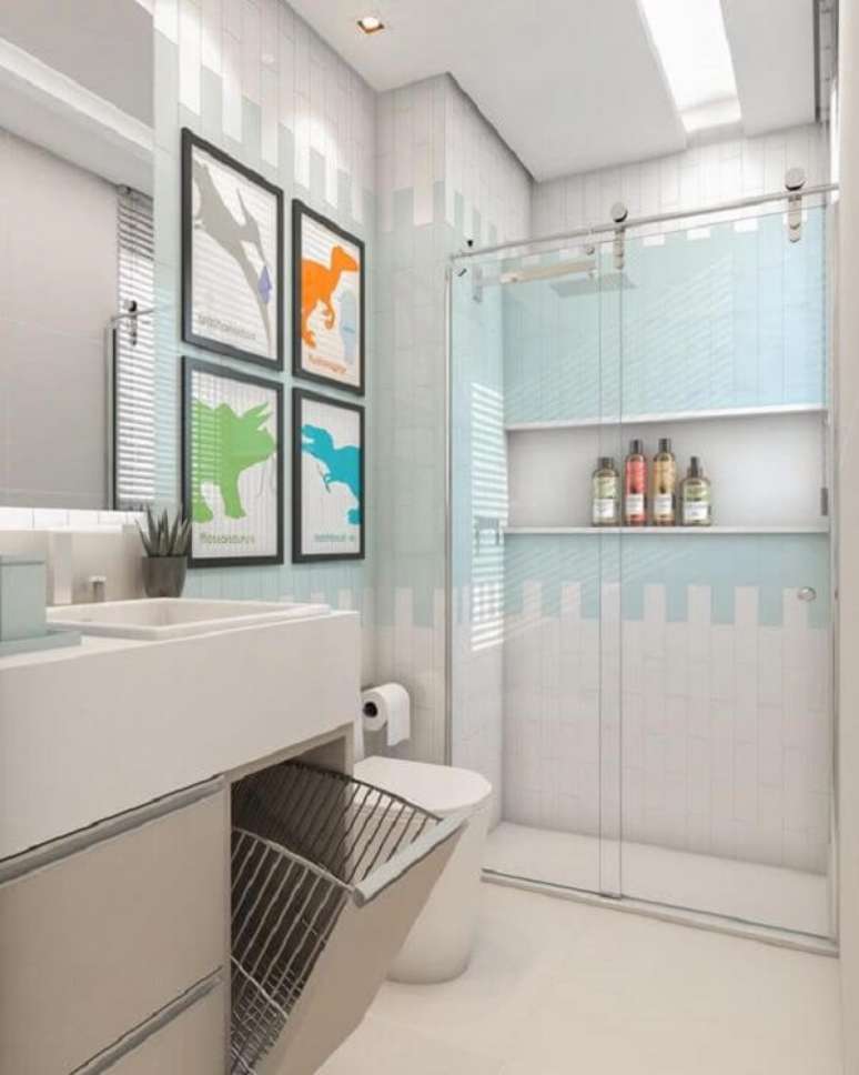 22. Quadros coloridos de dinossauros para banheiro infantil. Fonte: Pinterest