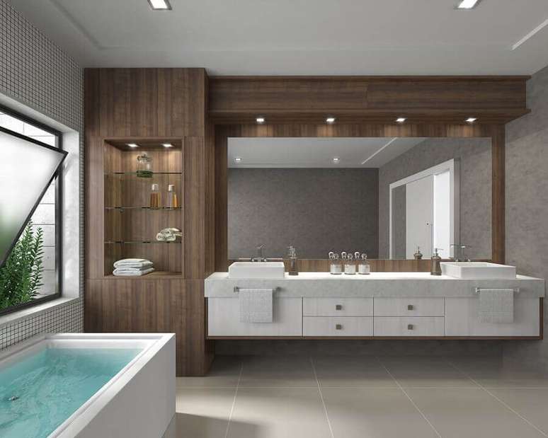 32. Decoração moderna para banheiro sob medida amplo com banheira – Foto: Modular Móveis