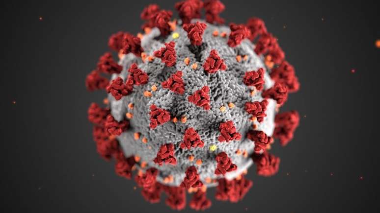 O vírus que causa a covid-19 tem proteínas spike (ou 'de pico'), representadas em vermelho