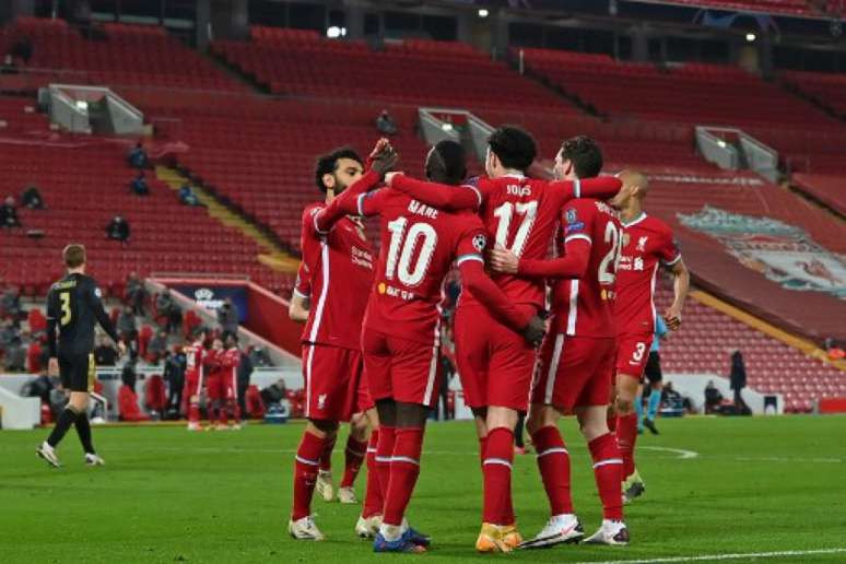 Liverpool chegou aos 12 pontos e garantiu vaga nas oitavas de final (Foto: Paul ELLIS / POOL / AFP)