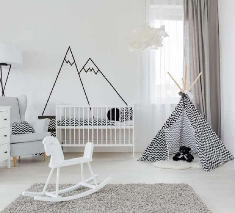 53. Decoração de quarto de bebê minimalista branco com detalhes pretos – Foto: Archtrends