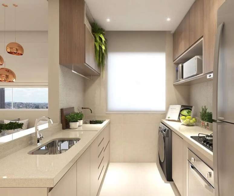 50. Cortina de rolo barra a entrada de luz natural na &aacute;rea de servi&ccedil;o e organizada. Fonte: Eduardo Muzzi