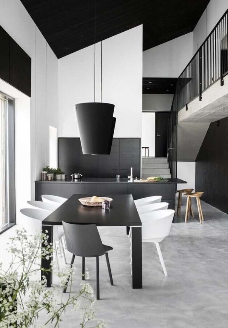 39. Decoração preto e branco para casa moderna com ambientes integrados – Foto: Futurist Architecture
