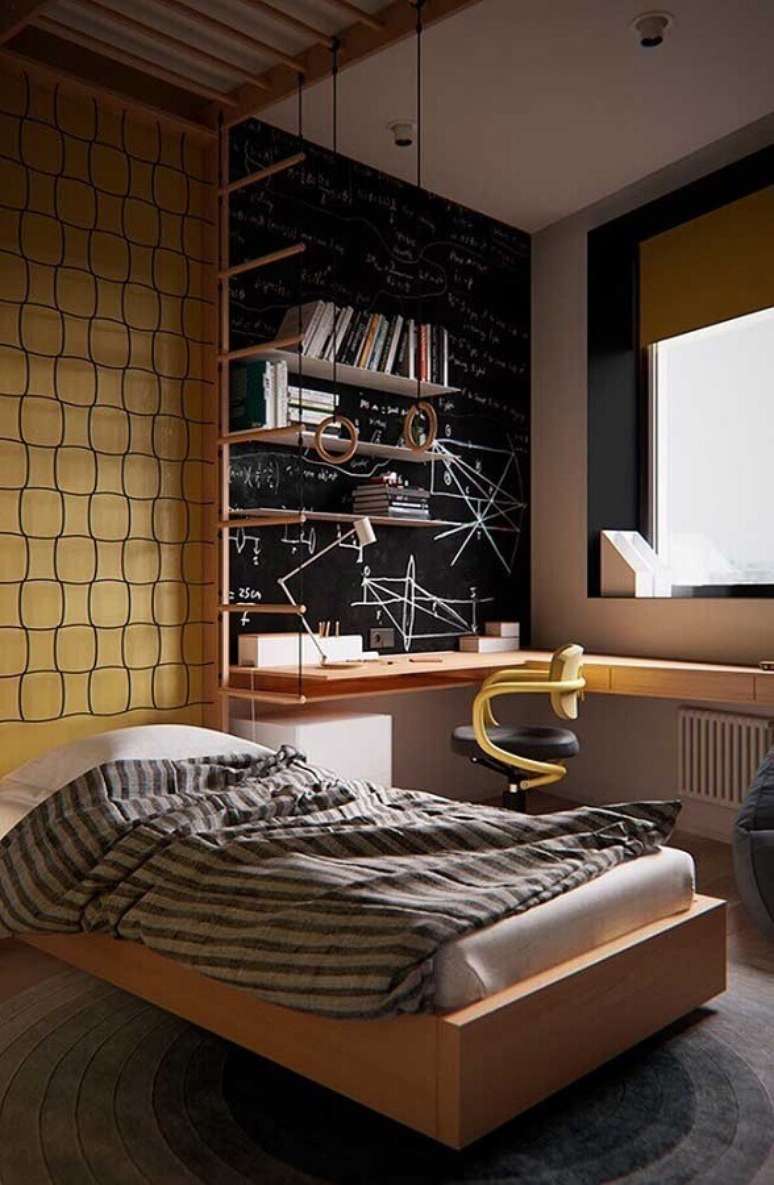 15. Decoração de quarto de solteiro masculino com bancada de madeira planejada – Foto: Futurist Architecture