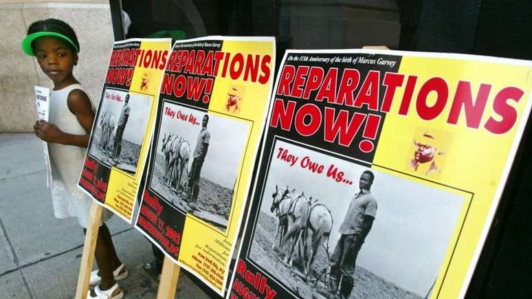 Protesto pedindo repara&ccedil;&otilde;es pela escravid&atilde;o nos EUA; debate em torno do tema cresce, mas divide opini&otilde;es