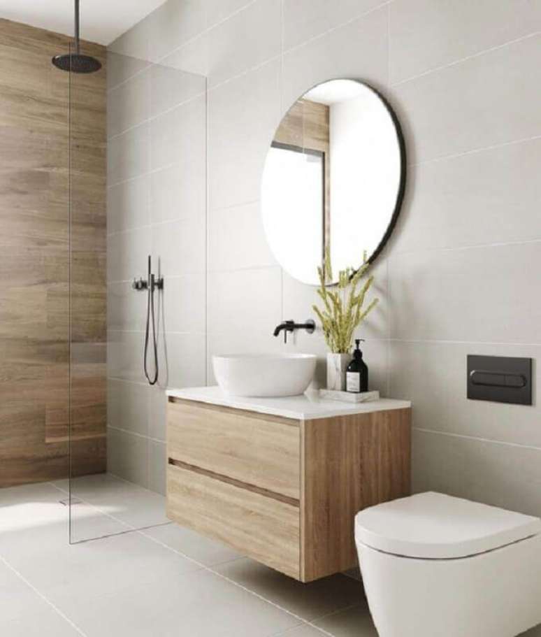 10. A madeira vai proporcionar sensação de acolhimento para o seu banheiro minimalista – Foto: Arquitetas Express