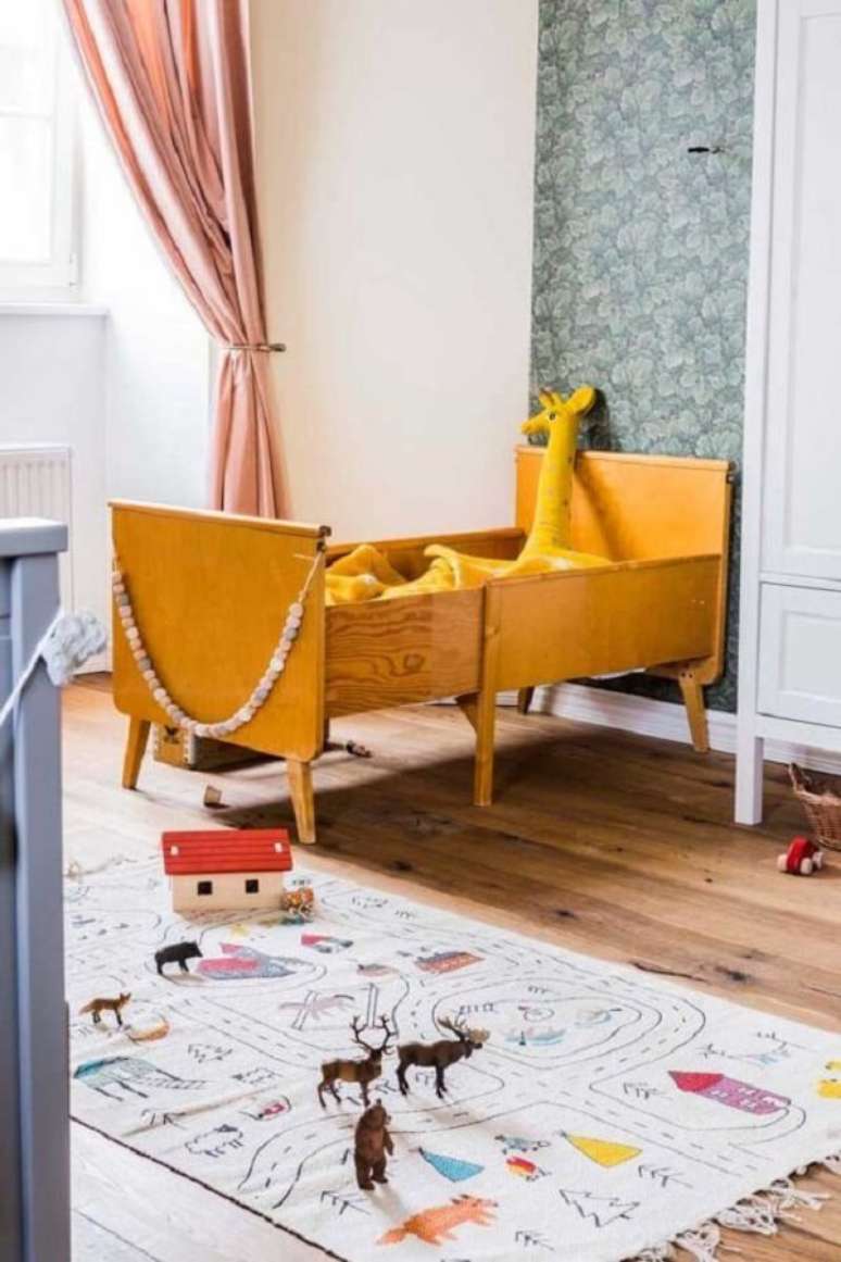 44. A estampa do tapete para quarto infantil grande traz ruas e casas, imitando uma cidade. Fonte: Pinterest