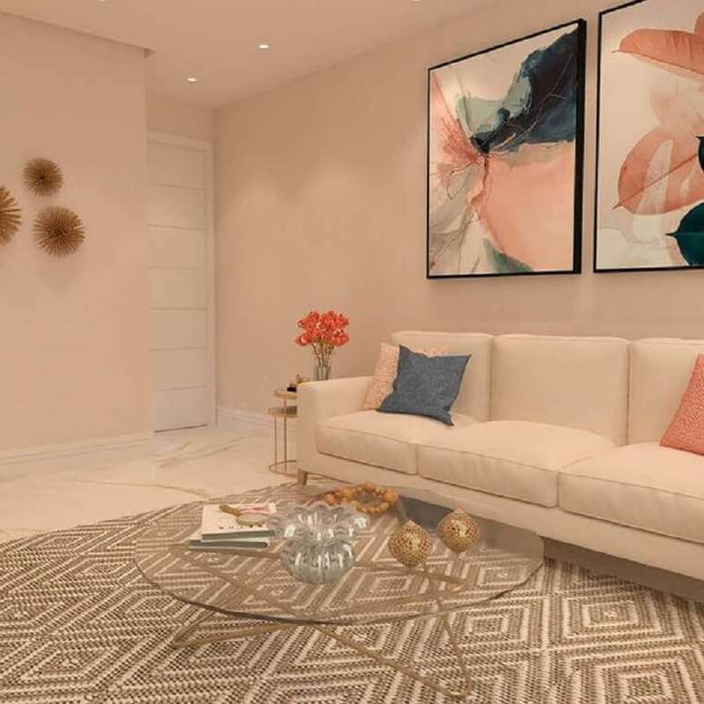 27. Decora&ccedil;&atilde;o clean para sala de estar com mesa de centro de vidro e tapete bege geom&eacute;trico &ndash; Foto: Jeito de Casa