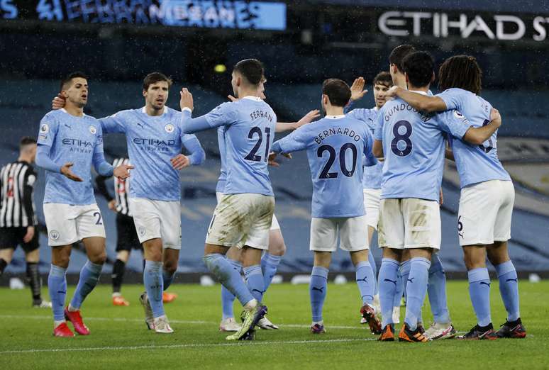 Jogadores do Manchester City comemoram gol contra o Newcastle United 
26/12/2020
Pool via REUTERS/Clive Brunskill 